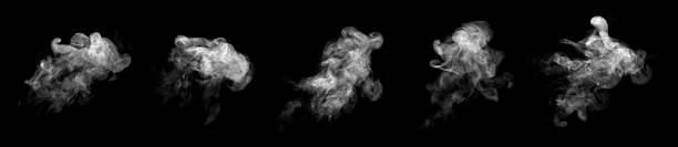 istock White smoke or steam isolated on black background, abstract texture symbolizing mystery, fire, cooking, vapor, fog, and dramatic effect, perfect for design, advertising, and creative backgrounds. 2233291671