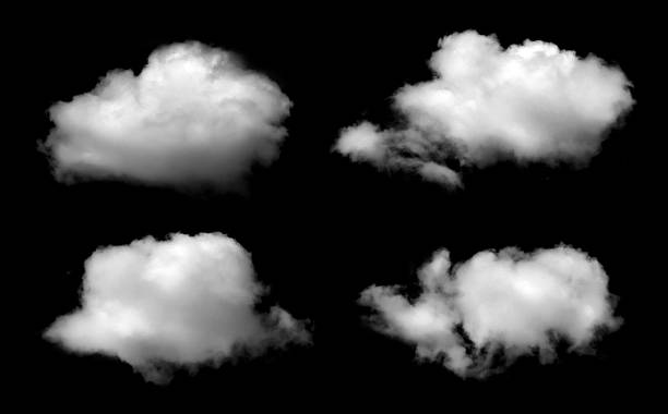 istock White fluffy clouds isolated on black background, abstract sky elements symbolizing weather, nature, dream, freedom, and imagination, perfect for design, advertising, and creative backgrounds. 2233291682