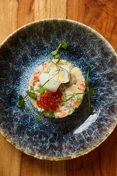 istock An Elegant Seafood Dish beautifully presented with exquisite caviar and vibrant microgreens 2233298650