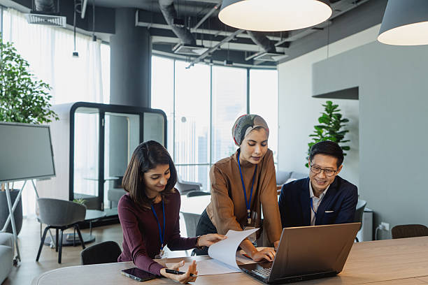 istock Multiracial Asian office executives at a small team discussion 2233304879