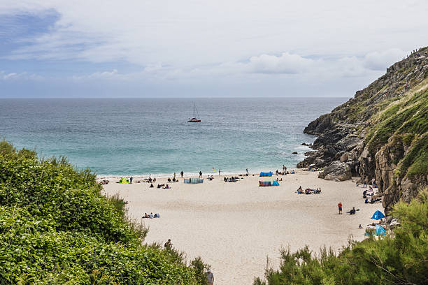 istock Porthcurno Beach, Cornwall. Sandy Cove with Turquoise Sea and Granite Cliffs View 2233305761