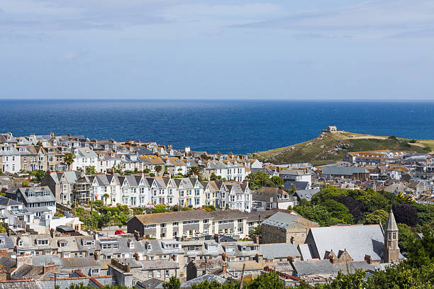 istock St Ives, Cornwall coastal townscape with harbour, rooftops and blue Atlantic horizon 2233305824