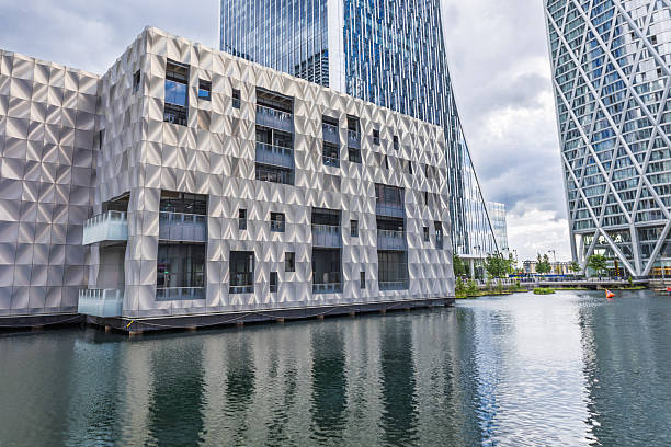 istock Modern Waterfront Architecture with Geometric Facade and Glass Towers 2233306282