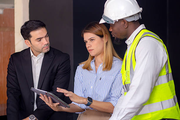 istock Group engineer team meeting discussing and planning for design with interior designer about project in construction site, architect team development and examining together, industrial and worker. 2233309330