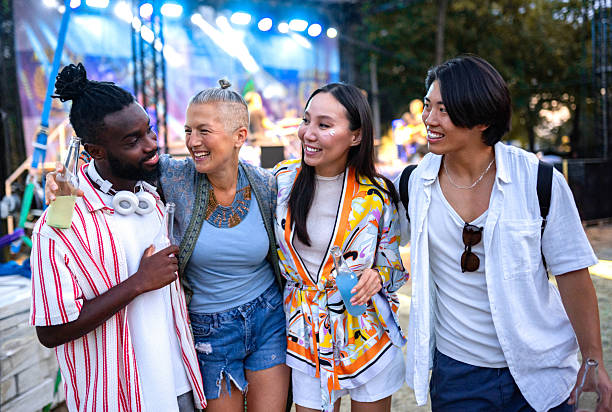 istock Friends enjoying a concert 2233310244