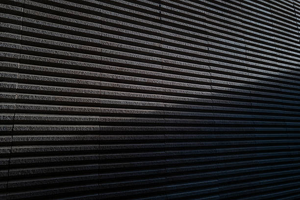 The three-dimensional shape of sunlight shining on the stone wall