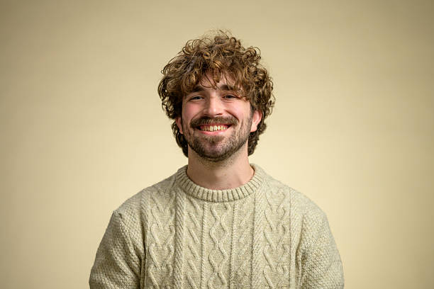 istock Smiling Hispanic Man in Warm Knitted Sweater 2233317315