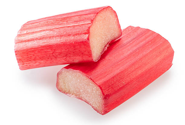 istock Two cuts of red rhubarb stem on white background. File contains clipping path. 2233320747