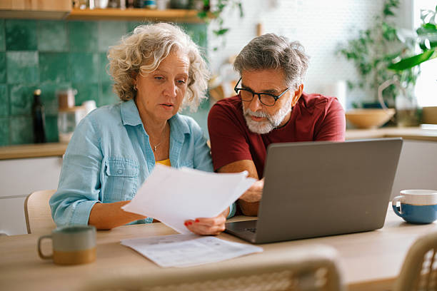 istock Senior couple concerned about household expenses 2233330549