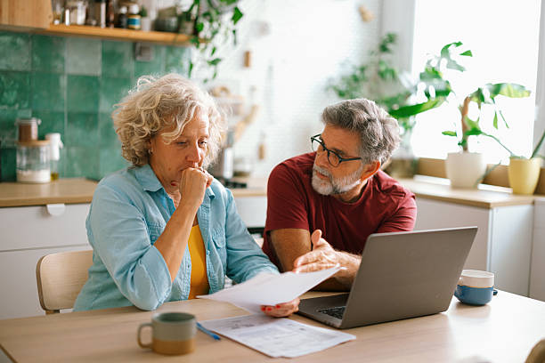 istock Elderly couple struggling with finances at home 2233330630