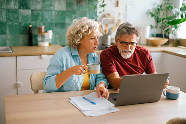 istock Senior couple concerned about household expenses 2233330705