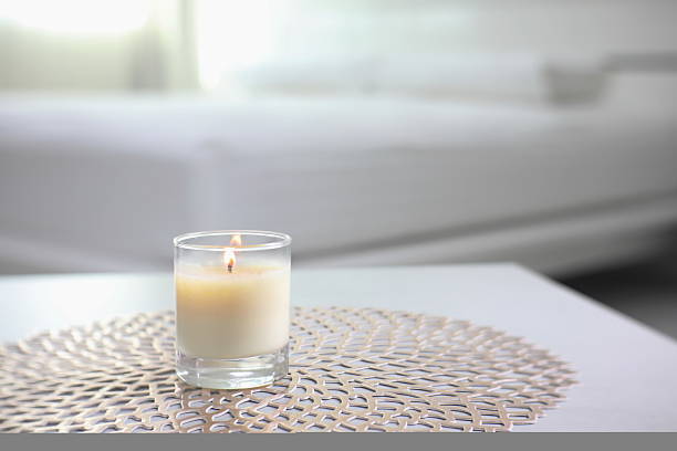 istock luxury aroma scented candle on nice table in bedroom for creating good relax ambient on Valentine day 2233333842
