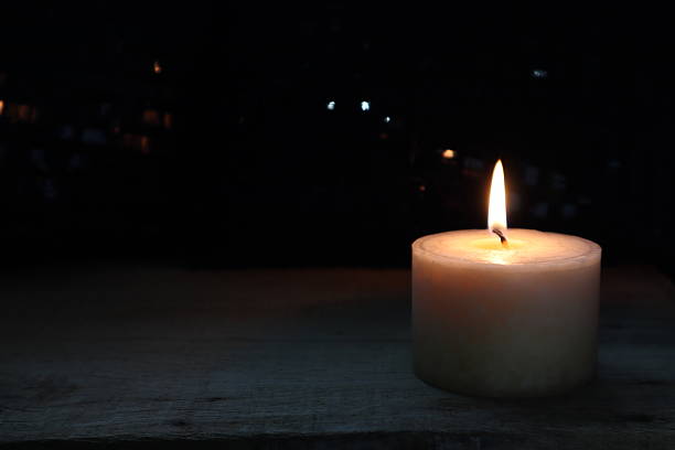 luxury lighting aroma scented candle on nice table in bedroom for creating good relax ambient on Valentine day with beautiful background room , candle making process natural soy wax candles , design glass tealight candle