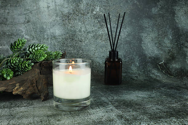 istock luxury aroma scented candle on nice table in bedroom for creating good relax ambient on Valentine day 2233334944