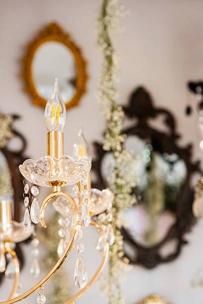 istock Elegant chandelier with decorative mirrors in stylish interior setting 2233340360
