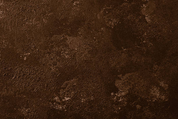 istock Rusty metal texture with rich brown and orange oxidation patterns 2233340753