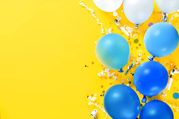 istock Festive party border with balloons confetti 2233342378