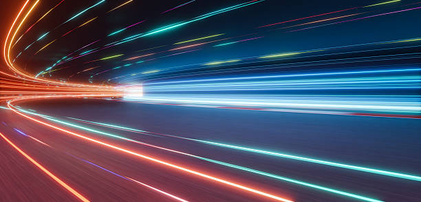 istock 3d rendering light trails illuminating a futuristic racing circuit at night 2233342513