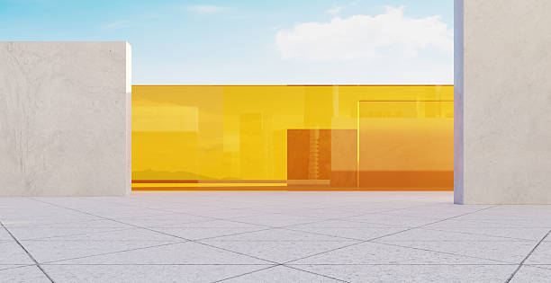 istock 3d rendering modern architecture showcasing orange glass facade and concrete walls under blue sky 2233342595