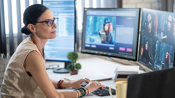istock Senior female website designer, generates an image with artificial intelligence and creates a prompt 2233342940