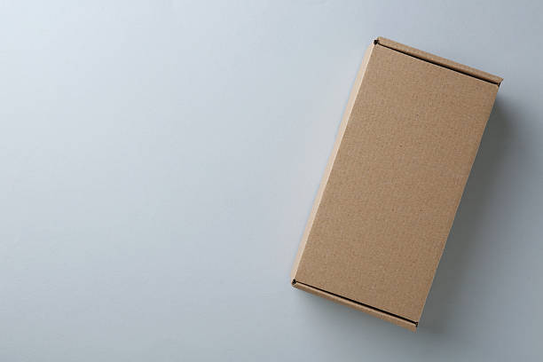 istock One blank cardboard box on white background, top view. Mockup for design 2233344169
