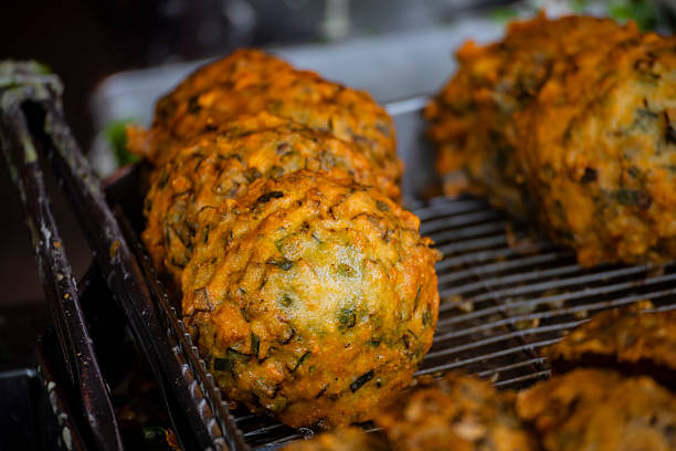 the making and final product of a traditional Taiwanese snack called Oyster Pancake (O-a-te)