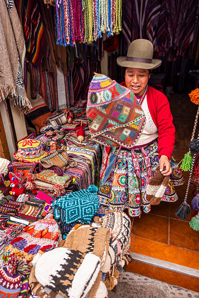 istock Peruvian woman spinning a wool in Pisac, Urubamba Valley 2233349413