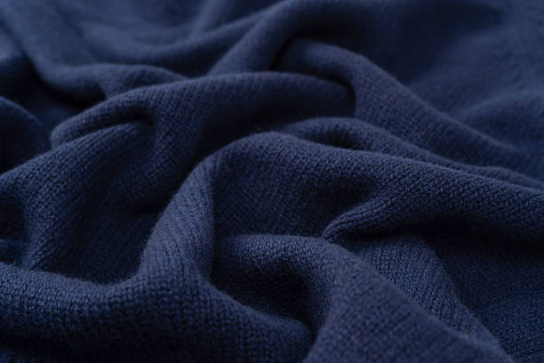 istock Navy blue merino wool sweater texture as background. Top view. 2233360983