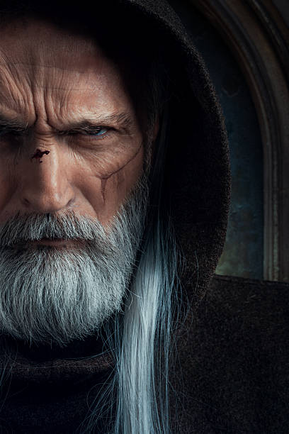 istock Close-up of intense medieval wizard face 2233363053