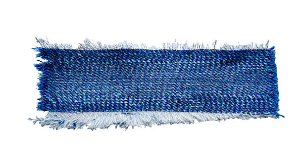 istock jeans. a frayed and torn piece of denim rag 2233365923
