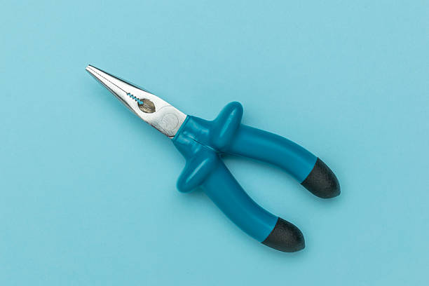istock Top View of Blue Needle Nose Pliers on Light Blue Background - Essential Hand Tool for Precision Work 2233367326