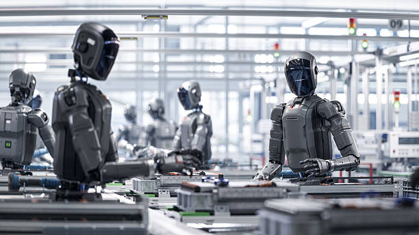 istock 3D Render: Industrial Automation AI Accelerated: Autonomous AI Powered Humanoid Robot Work at Factory on Assembly Line. Human Like Robot Working on Complex Detail in Industrial Environment. 2233368692