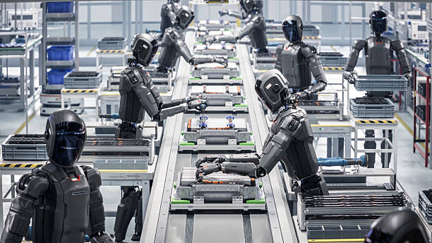 istock 3D Render: Autonomous AI Powered Humanoid Robots Work at Factory on Assembly Line. Industrial Automation AI Accelerated: Advanced Human Like Robot Working on Complex Detail in Industrial Environment. 2233368721