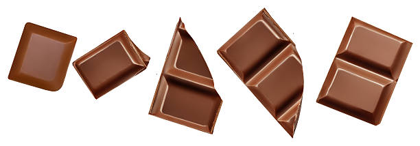 istock Broken chocolate bar pieces isolated on white. Chocolate  Top view. Flat lay. Pattern  2233373014