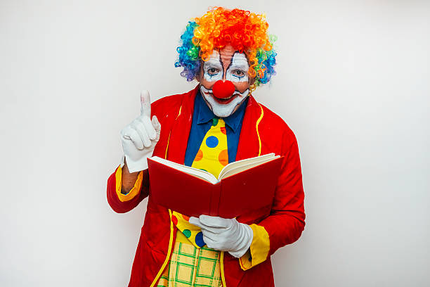 Portrait of a smiling clown with balloon