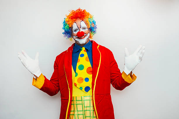 Clown with open arms smiling