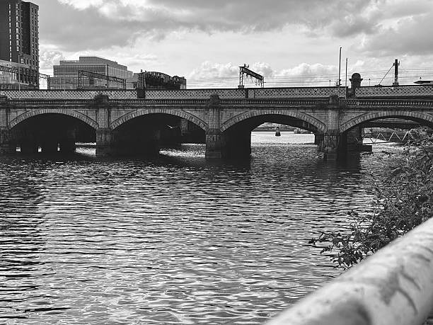 istock A railway bridge across the River Clyde in Glasgow against cloudscape 2233376152