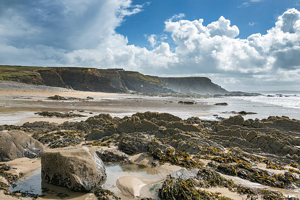 istock Stormy clouds and sea mist at Northcott Mouth 2233376277