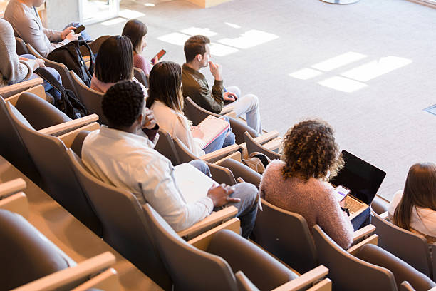 istock Diverse Students Attentively Listening in a Lecture Hall 2233376505