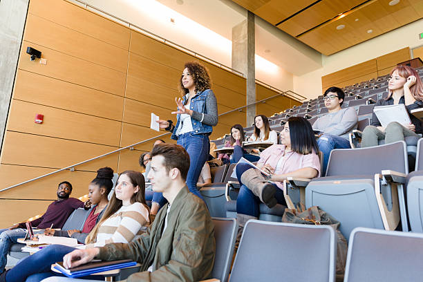 istock Diverse Students Listening Attentively in a College Classroom 2233376543
