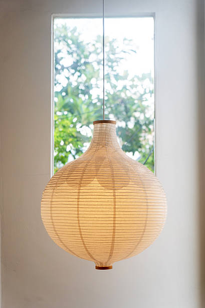 istock Elegant Paper Lantern Hanging in Window 2233377947