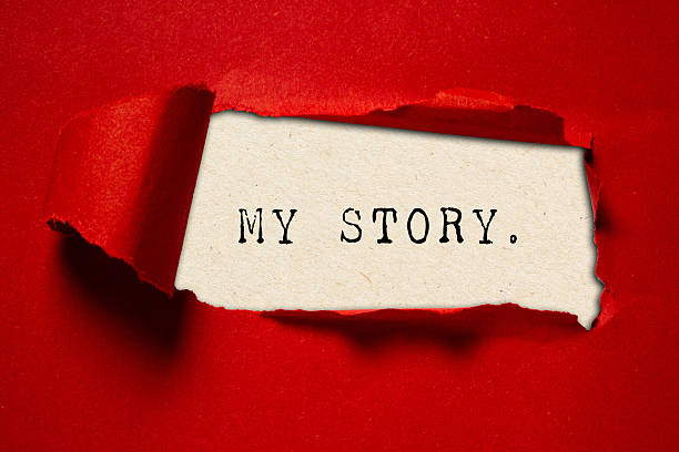istock My story written under torn paper. Success concept. 2233378733
