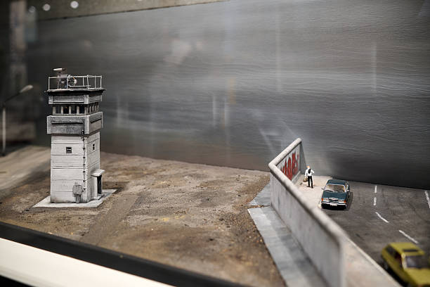 Detailed airport runway and control tower model exhibit, Berlin museum, overhead composition, artificial lighting, educational feel, great for aviation editorials, learning materials or travel marketing.