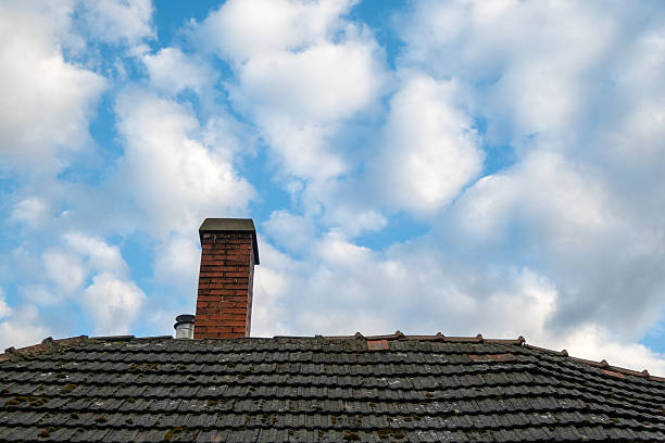 Old house roof with chimney