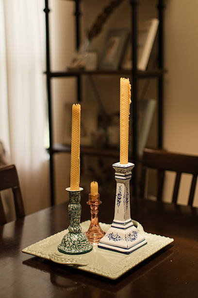 istock Assorted Candle Stick Holders with Beeswax Candles in an Eclectic Rustic Seaside Home in South Florida 2233384168