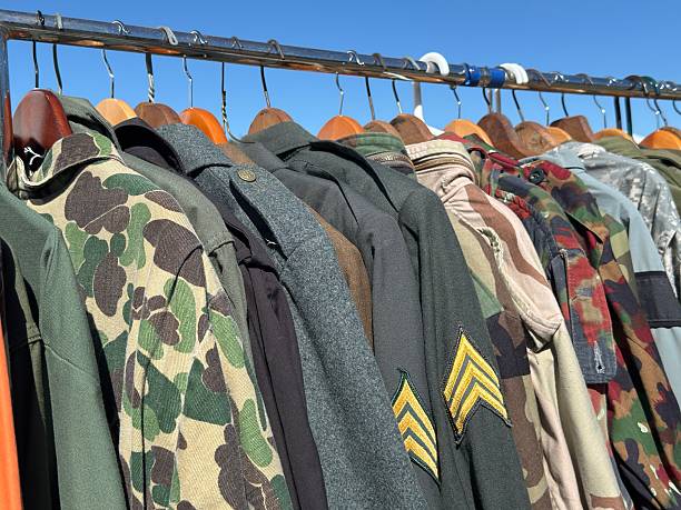 istock A rack of vintage military uniforms and jackets 2233385553