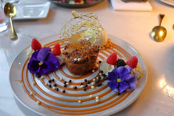 Pancake with ice cream and berries on a plate in a restaurant