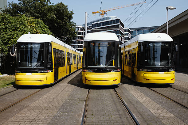 istock threee yellow trams in the center of berlin 2233389546