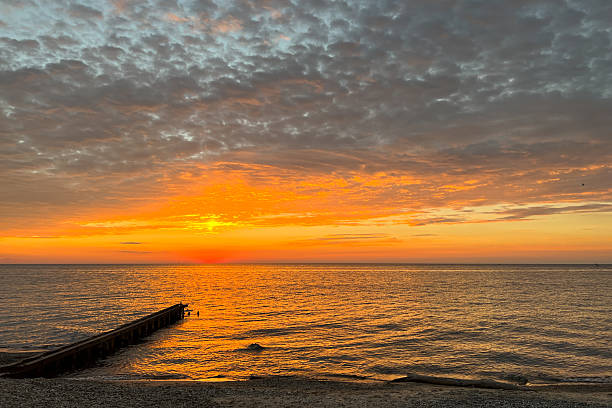 istock View of Lake Michigan sunset from beach. 2233394155