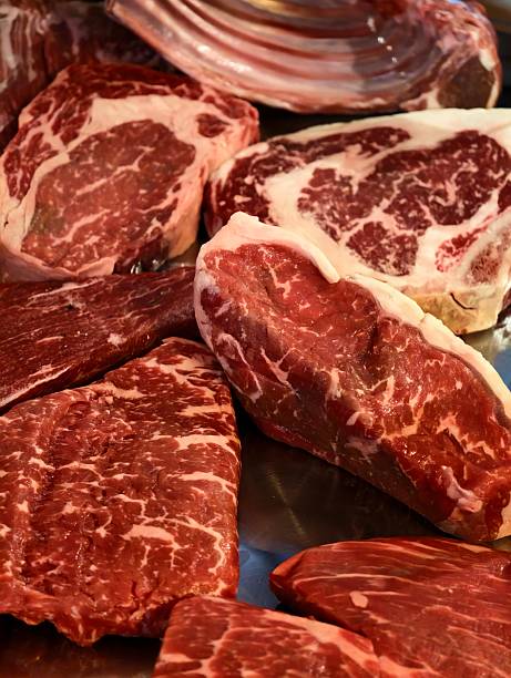 istock Various cuts of raw beef, high quality ribeye steaks ready for cooking 2233398763
